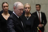 Putin still can't cry in public despite looking sad at funeral of man he sacked months ago