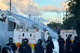 Belfast rioters blasted with water cannons as more carnage breaks out on streets