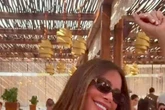 Sofia Vergara dances in plunging red minidress as she wows fans on Greece holiday