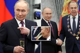 Putin downs champagne as he hands award to mouthpiece who threatened to nuke the UK