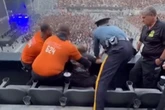 Man caught pleasuring himself at heavy metal concert beaten then dragged out by cops