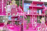 Mum spends £5,000 transforming home into 'Barbie Dreamhouse' – complete with pink slide