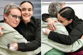 Brit Emily Damari smiles in mum’s arms after being freed from a 471 day hostage hell