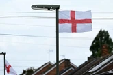 Thousands of England flags flown across UK pulled down straight away in row