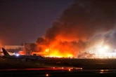 Massive fire at major airport with all flights suspended after horror blaze