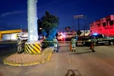 Drivers spot six half-naked bodies hanging from bridge in cartel-dominated city