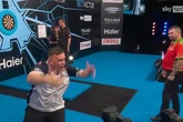 Luke Littler headbutts wall as England beat Wales in World Cup of Darts