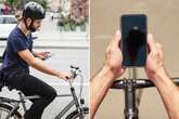 Cyclists using phones while riding could land themselves in jail in new crackdown