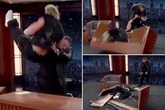 Jelly Roll chokeslams Logan Paul through table as The Undertaker's tips pay off
