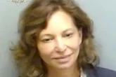 Smiling female teacher 'groomed pupil, 16, and planned to flee country with him'