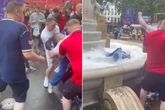 Scottish fans chuck fellow supporter into fountain - for being Rangers fan