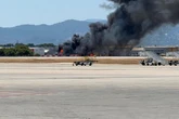 Majorca airport on 'pre-alert' after 'explosions heard' as blaze sparked nearby