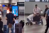 Man who set blaze at airport check-in desk smacked over head with fire extinguisher