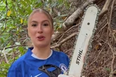 Chainsaw-wielding adult star Astrid Wett in bizarre tree stunt as she cackles evilly