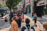 Nintendo Switch 2 fans queue around stores to get latest console with release hours away