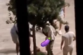 Tourists spark fury after 'simulating sex acts' on memorial to terror victims