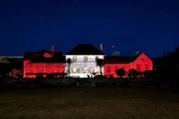 Falklands light up government building in England colours ahead of Argentina clash