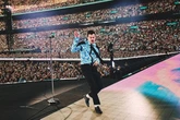 Harry Styles dances into the Guinness World Record books for a second time