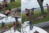 Battle Royale leaves two unconscious at boat party as bikini-clad girls scream in horror