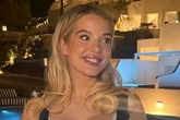 Helen Flanagan's curves burst over saucy 'maid' dress with dangerously short hem