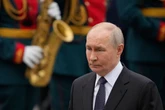 Putin's 'drooping face' fails to cry as despot can't show emotion at sombre memorial event