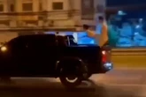 Bloke's bizarre excuse as he's caught romping with woman in back of speeding truck