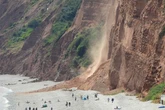 Sunbathers stranded after cliff comes crashing on Devon beach