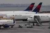 Delta Airlines pilot hauled off flight by cops as horrified passengers watched