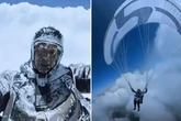 Terrified paraglider covered in ice crystals as 'cloud suck' propels him up 8,500m