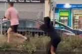Road rage brawl erupts as man punched and kicked to floor after putting woman in headlock