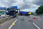 M60 chaos as eight lorries and cars completely shut motorway in horror smash