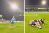 Pitch invader smashes penalty hero in head as star asks 'who the f*** kneed me'