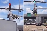 Construction worker suspended in mid-air as lorry crashes into him in horror caught on video