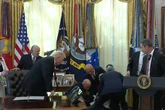 Trump watches in horror as top executive collapses at White House press conference
