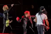 Guns N' Roses legend storms off stage and kicks drumkit in furious outburst