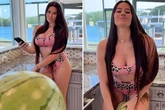 Lofty '7ft' star crushes whole watermelon between her bare thighs as fans go mad