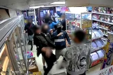 Shocking moment a feral gang of balaclava-clad teens battered a shop worker before stealing vapes