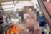 Naked man with legs spread wide open leaves commuters in shock as he boards train