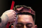 Man 'looks like a thumb' until sister books haircut that changes everything