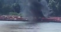 LiveMississippi River helicopter crash LIVE: Aircraft smashes into barge in fireball
