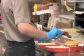 Knock-off McDonald's worker who spat in burger and spread it like sauce breaks silence