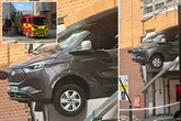 Ford Transit van overhangs multi-storey car park as people rushed to hospital