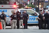 Police officer dead and NFL headquarters in New York evacuated after active shooter incident