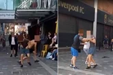 Yobs fighting in street throw chairs at kebab house window in mass brawl