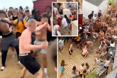 Mass '100-strong' beach brawl unfolds as Brits battle it out in summer heatwave