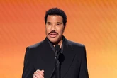 Lionel Richie, 77, stops concert after falling ill on stage and 'feeling dizzy'