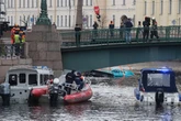 Bridge plunge bus survivor gasped for air in submerged vehicle and lost hold of missing wife’s hand