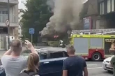 Smoke plume fills UK high street after blaze from 'electrical generator explosion'