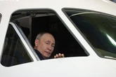 Weirdest Vladimir Putin outing ever as despot lovingly strokes a cockpit during inspection
