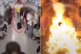 Train goes up in flames with 160 people inside as man throws liquid and sets it alight